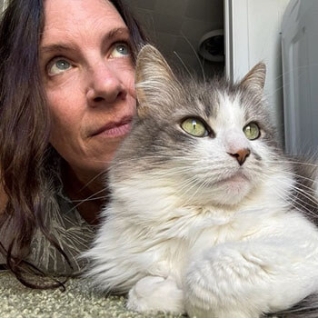 Kitty and her cat sitter mom staring into the distance.